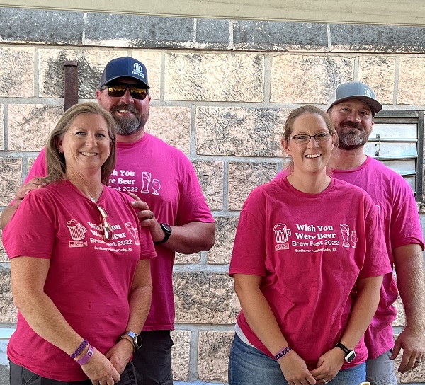 JL Evins Matt Smith and their spouses serving at BrewFest